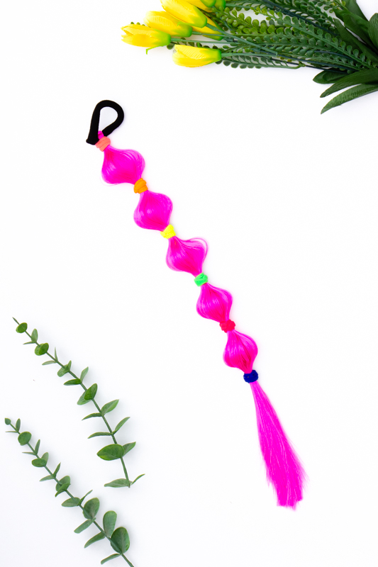 Коси зі штучного волосся на гумках